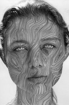 a black and white photo of a woman's face with lines drawn on it