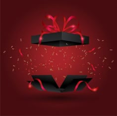 two black boxes with red ribbons and confetti are on a red background the box is open