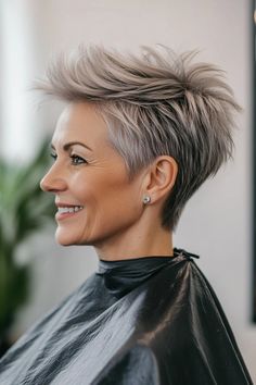 Click for More ➡️ | Save for Later ❤️  This pixie cut features long top layers that can be styled in various ways, adding versatility to the look. The longer layers add volume, making it a great choice for fine or thin hair. A soft pastel shade like lilac or rose gold adds a fun twist. (Pixie with Long Top Layers - Short Hairstyles For Older Women) Short Hairstyles For Women Over 40 Edgy Curly, Short Hair Over 50 Women, Edgy Short Hair For Women Over 50, Edgy Short Hair For Women Over 50 With Glasses, Short Silver Wigs For Women, Ash Blonde Pixie, Asymetrical Haircut Short Over 50, Thick Hair Pixie Cut, Tapered Haircut For Women