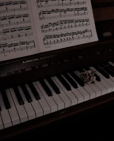 a piano with sheet music on it