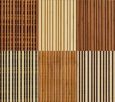 a close up of some different colored wood strips on a wall with the same pattern as it appears to have been woven together