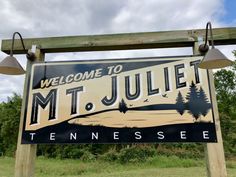 a welcome sign for mt juliat in tennessee