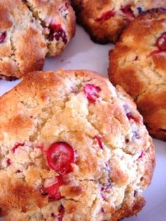 several cranberry cookies on a white plate