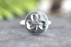 This listing is for one thick and sturdy sterling silver Irish shamrock and All Seeing Eye ring.  This Celtic ring features unique evil eye symbol inside of a three leaf clover.  Ancient Druids believed carrying around a three leaf clover helped you see evil spirits and communicate with the spirit realm.  This ring is full of beautiful and fun symbolism. It symbolizes Irish, Celtic, and Druid pride and spiritual insight.  - Choose your ring size at check-out! - Shamrock focal measures 14mm by 14 Spirit Realm, Affordable Rings, Three Leaf Clover, Irish Rings, Celtic Ring, Clover Ring, Eye Symbol, Irish Shamrock, Friendship Rings