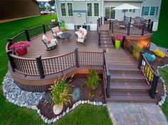 an aerial view of a deck and patio