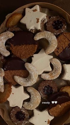 a box filled with lots of different types of cookies