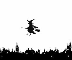 a black and white silhouette of a witch flying over a city