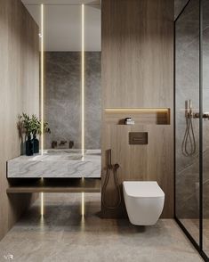 a modern bathroom with marble walls and flooring