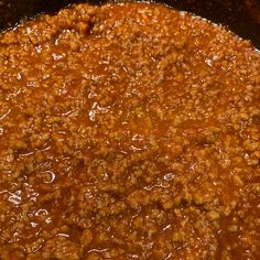 a pot filled with chili sauce on top of a stove