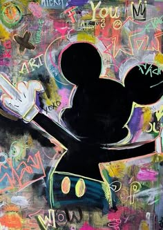 a mickey mouse painting with lots of graffiti on it