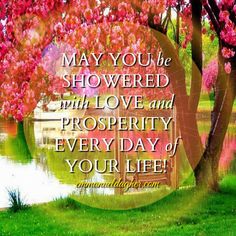 a tree with pink flowers in the background and a quote on it that says, may you be showed with love and prosperity every day of your life