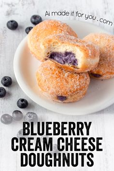 blueberry cream cheese doughnuts on a white plate