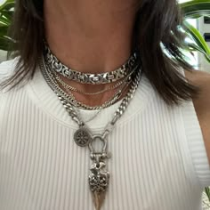 You won't go unnoticed with this awesome multi strands necklace with a lot of details.  It is decorated with antique silver arrow head pendant and small viking pattern charm, a unic look! MATERIAL * 304 Stainless steel (hypoallergenic, waterproof and won't change color).  The necklace is adjustable from 14 to 20 inches. On pictures 12.5 inches neck showing necklace attached at 14 inches. You will receive this beautiful necklace in a box decorated with bow, perfect for a gift. Similar necklaces; https://www.etsy.com/ca-fr/listing/1562703226/gros-collier-multi-rangs-argent-a?click_key=5cfd3ae5fee2736330ebfd8e583edb243fcee10a%3A1562703226&click_sum=43691c8d&ref=shop_home_active_1&crt=1&sts=1 https://www.etsy.com/ca-fr/listing/1699085930/gros-collier-multi-couches-argent-avec?click_key=e45e582 Chain Stack Necklace, Silver Necklaces Chunky, Silver Pendant Chain Necklace For Layering, Silver Stainless Steel Jewelry For Layering, Silver Multi-strand Oxidized Jewelry, Bohemian Silver Chunky Chain Necklace, Bohemian Silver Necklace With Chunky Chain, Silver Bohemian Necklace With Chunky Chain, Vintage Silver Jewelry With Double Chain