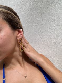 Gold Dangle Earrings - These unique boho make quite the statement! Perfect for dressing up a nice top or on a beach vacation! These interlocking double hoops absolutely stun. 18k gold & stainless steelLength: 11x11cmWeight: about 3oz- water/sweat resistant- gold filled- Style: Minimalist Gold Dangle Earrings, Style Minimalist, Gold Earrings Dangle, Nice Tops, Ring Necklace, Beach Vacation, Ring Earrings, Solid Gold, Gold Earrings