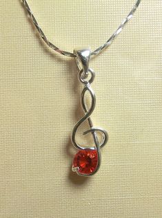 **Brand New**    ***In Stock And Ready For Shipment***     18K White Gold Plated Musical Note "Red" Cubic Zirconia  Designer Style Pendant  With Chain CZ Appx. 1/2ct  (18k GP Hallmark)   !!!! LIMITED TIME OFFER !!!!!   Don't Miss Out Order Today!! Makes a Great Gift!!     View My Feedback     Visit My eBay Store   Payment All payments through Paypal only. Use your credit card through Paypal...safe, secure and FREE. All payments must be made within 48hrs of purchase for Buy-it-now items, unless c Music Note Jewelry, Pendant With Chain, Musical Note, Music Note, Designer Style, Music Notes, Hallmark, Ebay Store, Limited Time