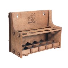 a wooden wine rack with six bottles on it's sides and the bottom section open