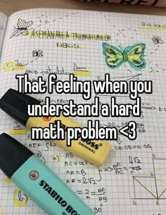 two pens sitting on top of a notebook with the words that feeling when you under stand a hard math problem