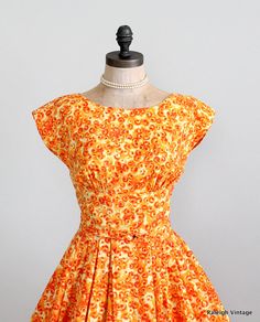 I absolutely love this dress! The color is amazing!  Vintage 1950s Dress  50s Orange Swirl Cotton by RaleighVintage, $92.00 Cotton Party Dress, Swirl Dress, Vintage 1950s Dress, Vintage 1950s Dresses, Wrap Dresses, 50s Dresses, 1950s Dress, Orange And Yellow, Shades Of Orange