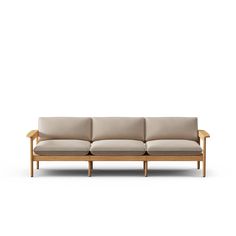 an image of a couch with four seats on the back and one arm folded out