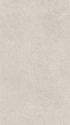 an image of a white textured wallpaper with no lines or dots on it