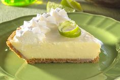 a slice of key lime pie on a green plate