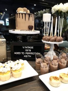 desserts and pastries on display at a bakery