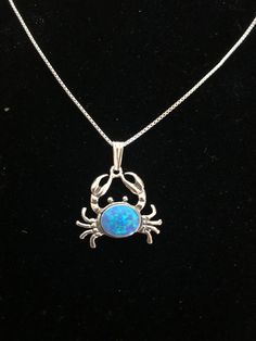 "Blue opal crab necklace /southwestern jewelry /handmade jewelry design /opal necklaces /opal jewelry Stone width: 9mm Stone height: 7mm Chain lengths: 18\" or 20\"" Nickel-free Opal Necklaces As Gift, Blue Opal Nickel-free Jewelry, Opal Round Pendant Jewelry For Gifts, Nickel-free Blue Opal Jewelry, Opal Cabochon Jewelry Gift, Opal Round Pendant Jewelry Gift, Opal Cabochon Jewelry For Gift, Nickel-free Opal Necklace Gift, Opal Pendant Necklace With Large Pendant