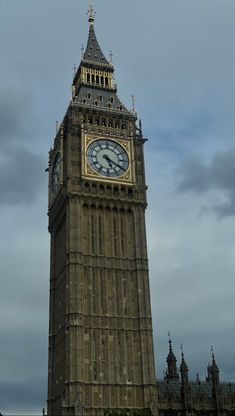 the big ben clock tower towering over the city of london