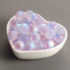 a white bowl filled with lots of bubbles