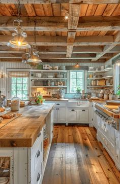 an old fashioned kitchen with wooden floors and white cabinets, wood counter tops, and open shelving