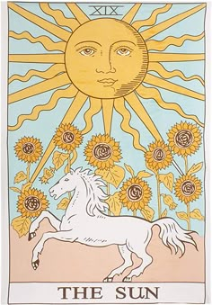 the sun tarot card with a white horse and sunflowers