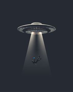 an alien ship floating in the air with its lights on and a person underneath it