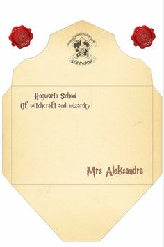 an award certificate for hogwart's school of witchcraft and wizardry, with two red roses on top