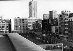 an old black and white photo of the city