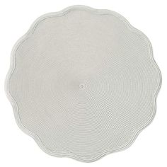 a round white placemat on a white background