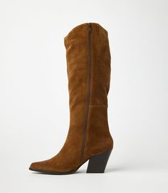 Crafted from soft suede, these pointed toe Western high boots are the perfect addition to any fall wardrobe. Pair them with jeans, skirts, or dresses for a versatile and stylish look that's perfect for the season's colors. With a sleek design and comfortable fit, these boots are a must-have. True to size Upper/Lining: Leather Heel height: 3" Platform: 0.25" Shaft Height: 17" Shaft Circumference: 14.5" Pointed toe shape Full zipper closure at inner ankle Imported Seychelles | Karen Kane Pointed T Fall Suede Heeled Boots With Wide Calf, Fall Wide Calf Suede Heeled Boots, Wide Calf Suede Boots For Fall, Suede Boots With Stacked Heel For Fall, Fall Wide Calf Heeled Boots With Suede Lining, Fall Wide Calf Suede Knee-high Boots, Knee-high Suede Boots For Workwear, Knee-high Suede Workwear Boots, Suede Heeled Boots With Wide Calf Fit