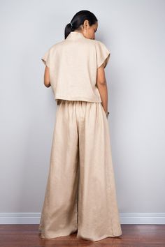 "Linen pants, Handmade natural linen long wide leg palazzo pants. Beige brown high waist women's summer pants Made with the highest care this beautifully crafted garment will fit you perfect thanks to the elastic strap on the back. I like wearing this one when sitting in the garden reading a book and dream away. Soul of the Orient Collection - Original Design & Produced by NUICHAN PRODUCT SIZE : One Size Fits Most * Waist : elastic round waistband up to 26 - 38\" * Hips : (max 40\") if your Flax Wide Leg Pants For Loungewear, Brown Linen Wide Leg Bottoms, Brown Linen Relaxed Fit Wide Leg Pants, Brown Linen Wide Leg Pants For Spring, Brown Relaxed Fit Linen Wide Leg Pants, Spring Brown Linen Wide Leg Pants, Brown Wide Leg Linen Bottoms, Wide Leg Flax Pants For Summer, Beige Flax Pants For Summer