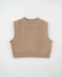 a knitted sweater vest on a white background