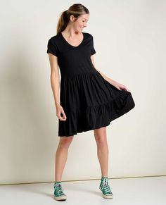 Feminine and flirty minus the fuss. Sustainable materials make this dress built to last, and hand pockets give her a dose of added practicality. In other words, fall perfection.DetailsFit: Swing silhouette, v-neck, tiered dress that hits above the kneeDress lengths by size: XS: 34 1/2" S: 35" M: 35 1/2" L: 36" XL: 36 1/2" Feel: Soft, breathable eco-friendly organic cotton and TENCEL™ Lyocell slub with a bit of stretch for added comfortFeatures: Inherent odor control, on-seam hand pocketsFabric & Paper Sleeves, Spring Prints, In Other Words, Knee Dress, Womens Size Chart, Good Stretches, Short Sleeve Dress, Tiered Dress, Sustainable Materials