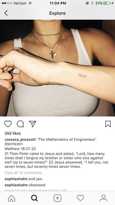 a woman's arm with a cross tattoo on it, and the caption reads