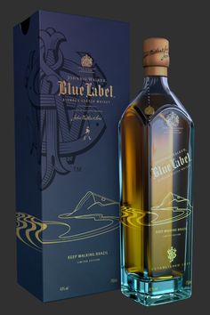 a bottle of blue label whisky next to a box