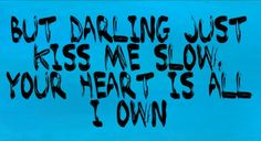 the words are written in black ink on a blue background, but daring just kiss me slow your heart is all down