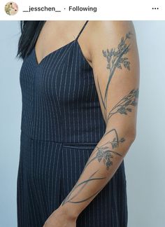 a woman with a tattoo on her arm