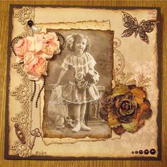 an altered photo with flowers and butterflies on it's side is displayed in front of a wooden table