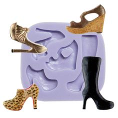 two pairs of high heeled shoes next to a shoe mold