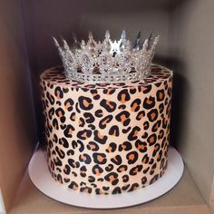 a leopard print cake with a crown on top