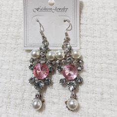 *This Beautiful, Sparkly, Pink Crystal Stone Earrings With Gemstone And Pearls Is Perfect For Your Formal Attire Or Just Because. It's About 2.5" Long Dangle Fashion Earrings. *In This Listing You Can Buy By Bundle Which Is 3 For $18 Or Buy Just 1. *Material: Zinc Alloy A Great Gift For Yourself Or To Someone. Crystal Heart Earrings, Bronze Earrings, Silver Jewelry Earrings, Heart Drop Earrings, Cz Stud Earrings, Crystal Stud Earrings, Pearl Gemstone, 925 Silver Jewelry, Flower Studs