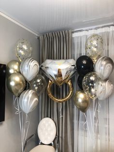 the balloons are all over the room