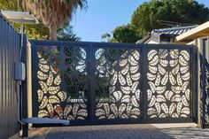 a gate that has been designed to look like an intricate design