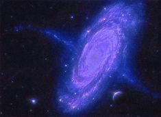 an image of a spiral galaxy in the night sky